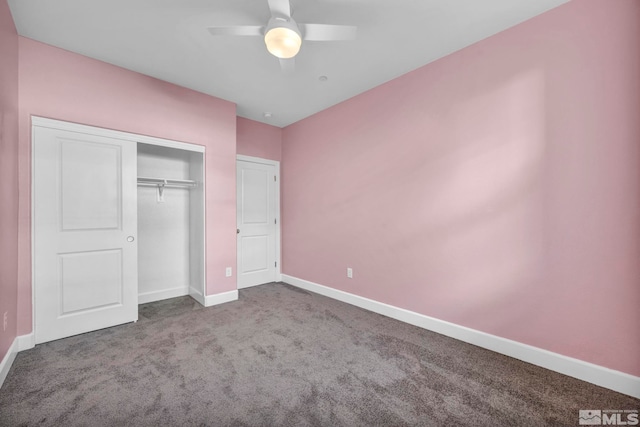 unfurnished bedroom with carpet flooring, ceiling fan, and a closet