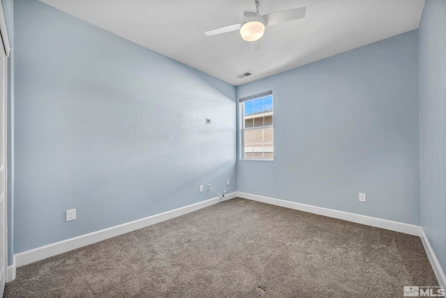 unfurnished room with carpet floors and ceiling fan