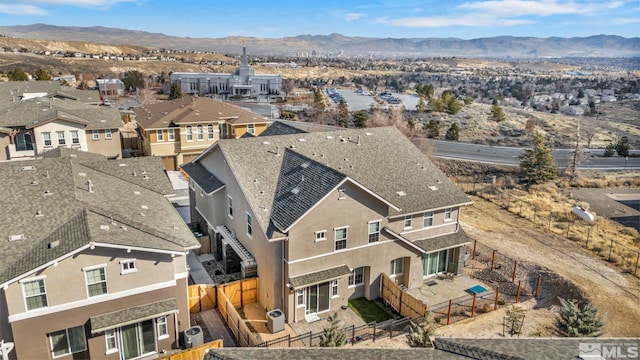 drone / aerial view featuring a mountain view