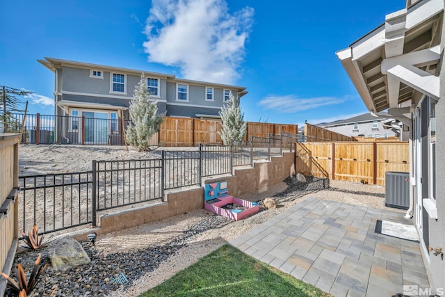 view of patio with central AC unit