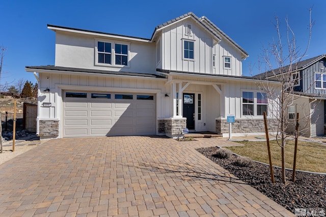 view of front of home with a garage