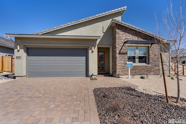 ranch-style house featuring a garage