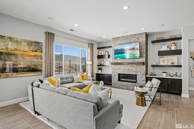 living room featuring a fireplace