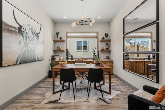 dining room featuring an inviting chandelier