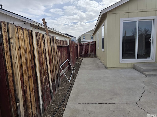 view of property exterior featuring a patio