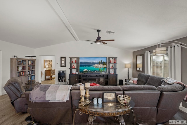 living room with lofted ceiling with beams, light hardwood / wood-style floors, and ceiling fan