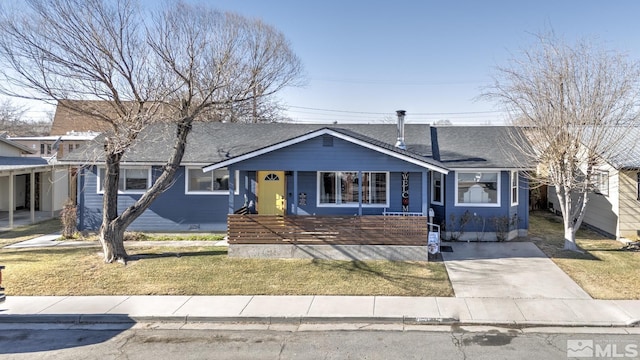 view of front of home featuring a front yard and a porch