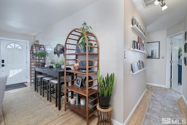 interior space with light hardwood / wood-style floors