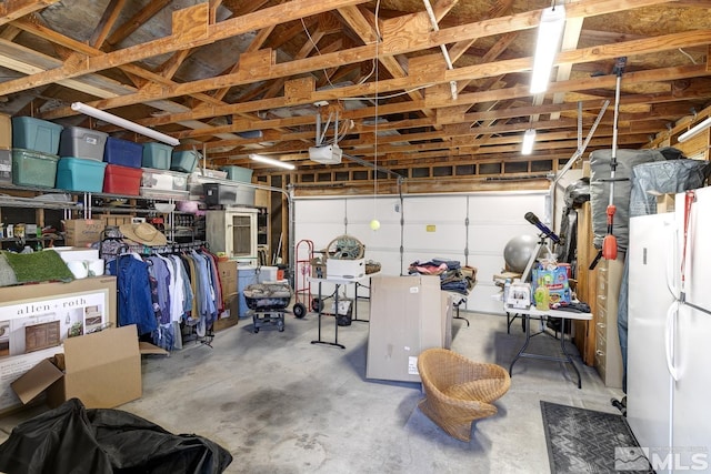 garage with white fridge