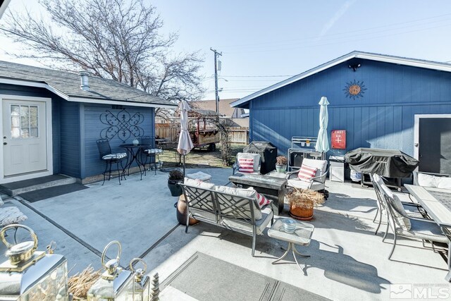 view of patio / terrace featuring a grill and outdoor lounge area