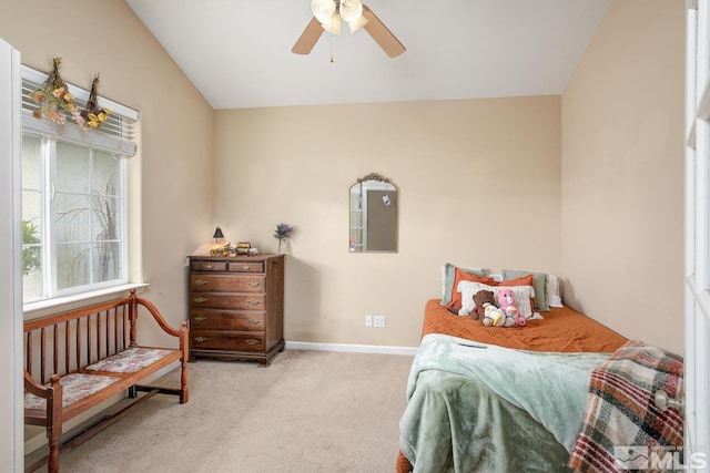 carpeted bedroom with lofted ceiling and ceiling fan