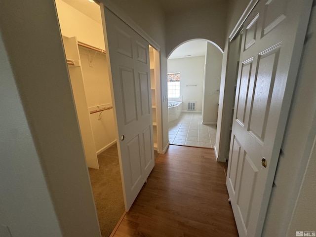 hall featuring wood-type flooring