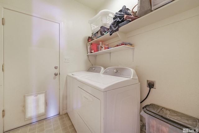 laundry area with independent washer and dryer