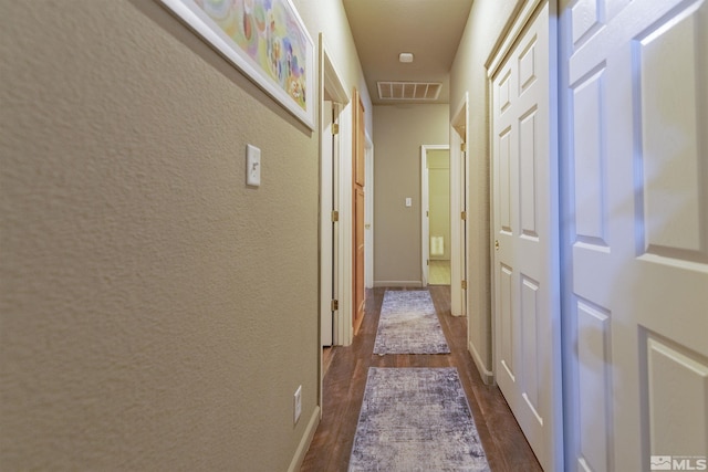 hall featuring dark hardwood / wood-style flooring