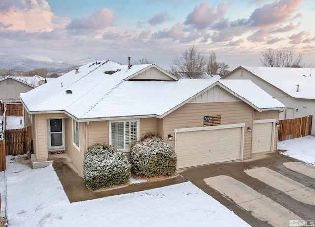 view of front of property featuring a garage