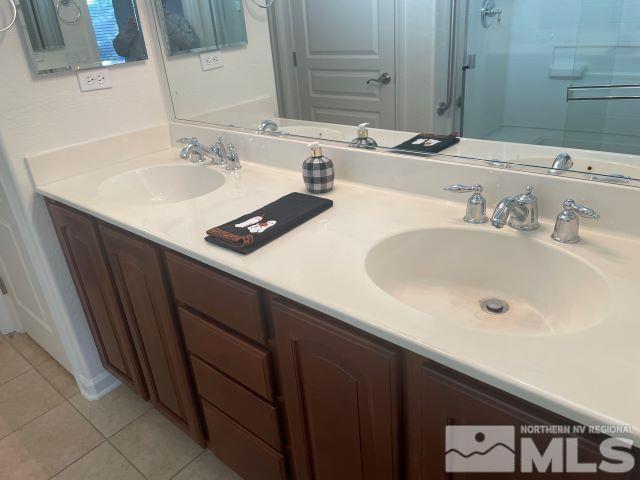 bathroom featuring vanity and tile patterned floors