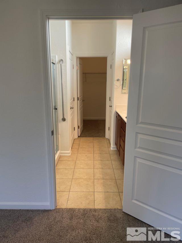 bathroom featuring tile patterned floors and vanity