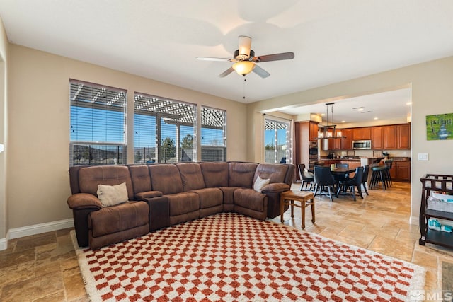 living room with ceiling fan