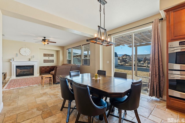 dining area with ceiling fan