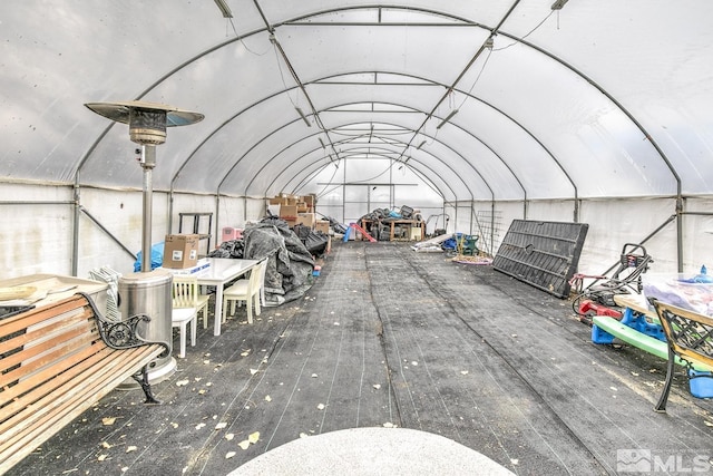 miscellaneous room with vaulted ceiling