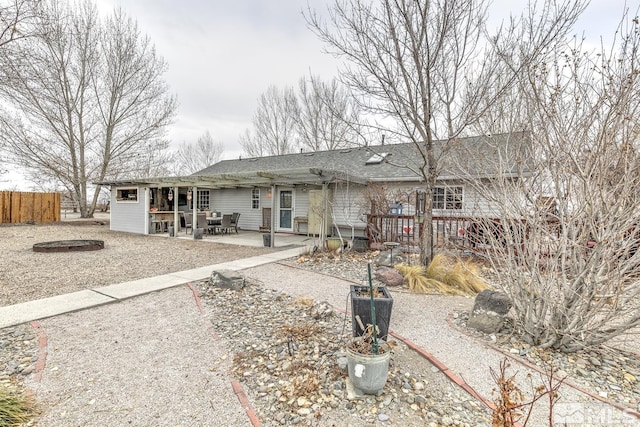 rear view of house with a patio