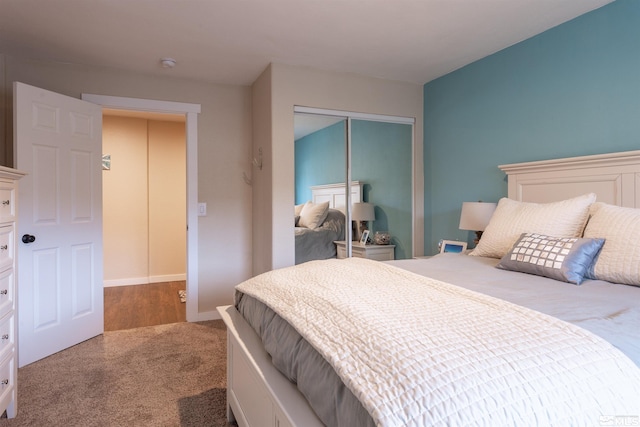 carpeted bedroom with a closet