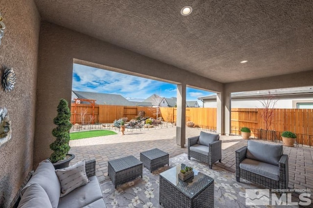 view of patio / terrace with an outdoor hangout area