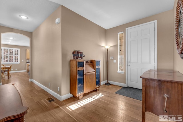 foyer entrance featuring hardwood / wood-style flooring