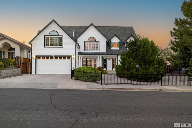 view of front of property with a garage