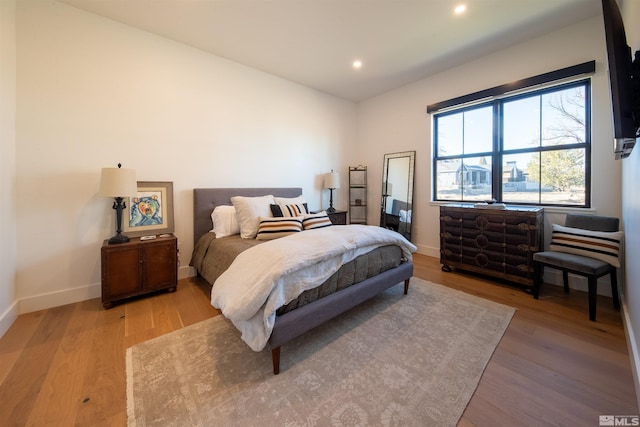 bedroom featuring light hardwood / wood-style flooring