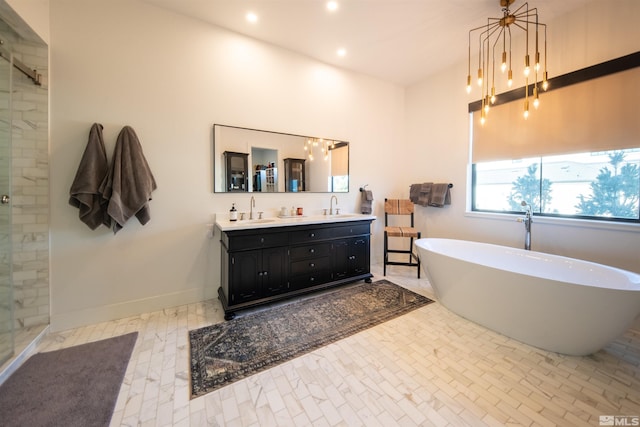 bathroom with vanity, plus walk in shower, and a chandelier