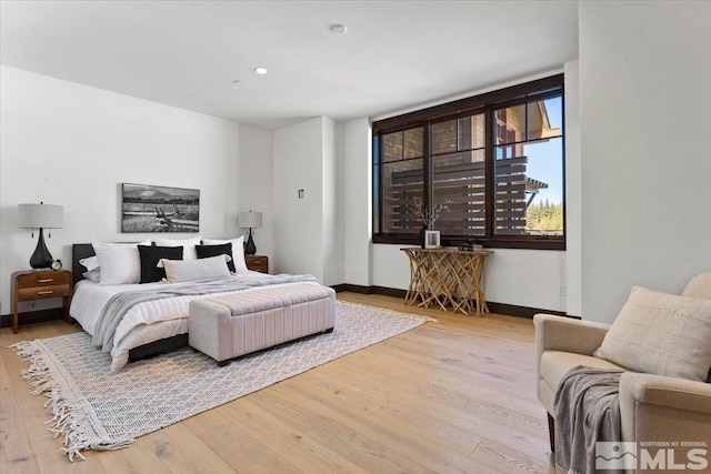 bedroom featuring light wood-type flooring