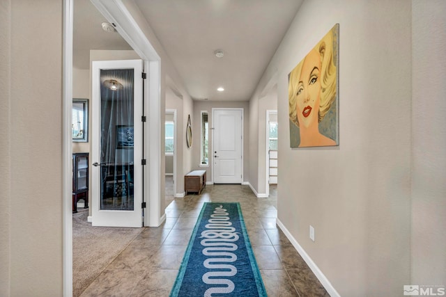 interior space with tile patterned floors