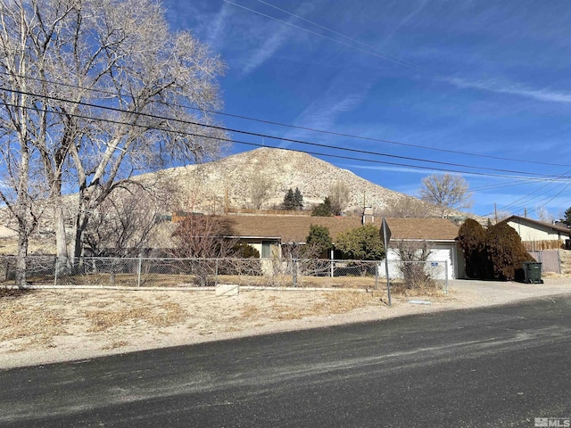 view of front of property with a mountain view