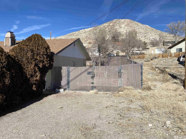 view of home's exterior featuring a mountain view