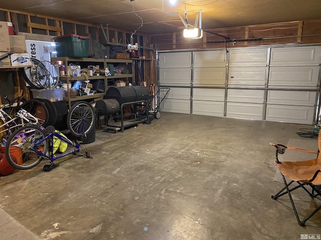 garage featuring a garage door opener