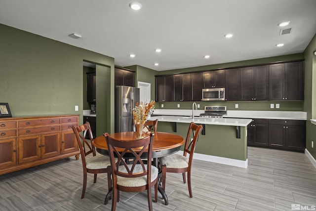 dining room featuring sink