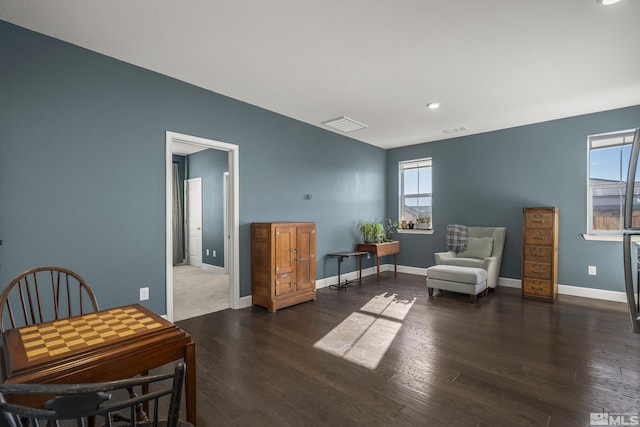 sitting room featuring dark hardwood / wood-style flooring