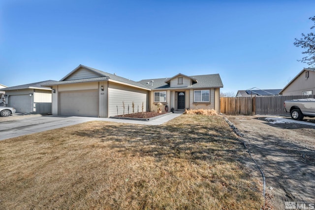 ranch-style home with a garage and a front yard