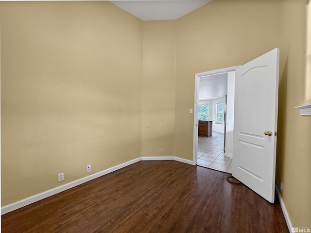 empty room with light hardwood / wood-style flooring