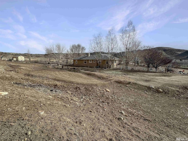 exterior space with a mountain view and a rural view