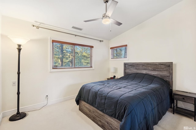 carpeted bedroom featuring vaulted ceiling and ceiling fan