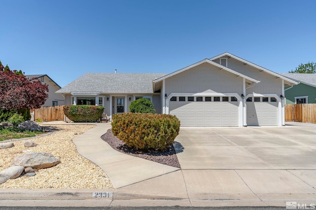 ranch-style house featuring a garage