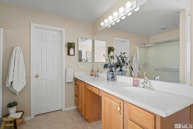 bathroom with vanity and walk in shower