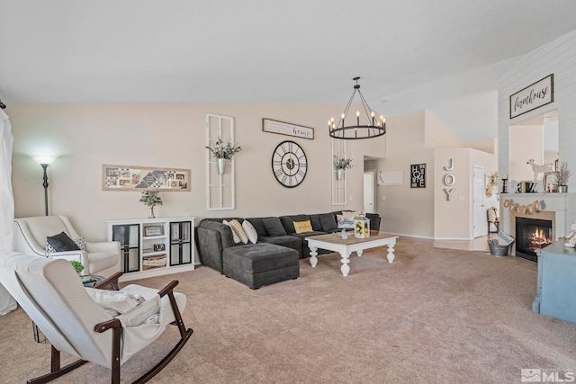 carpeted living room featuring vaulted ceiling and a notable chandelier