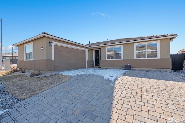 single story home with a garage