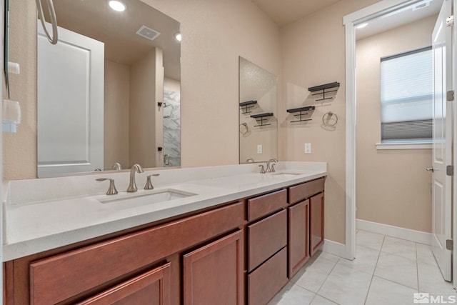 bathroom featuring vanity and tile patterned floors