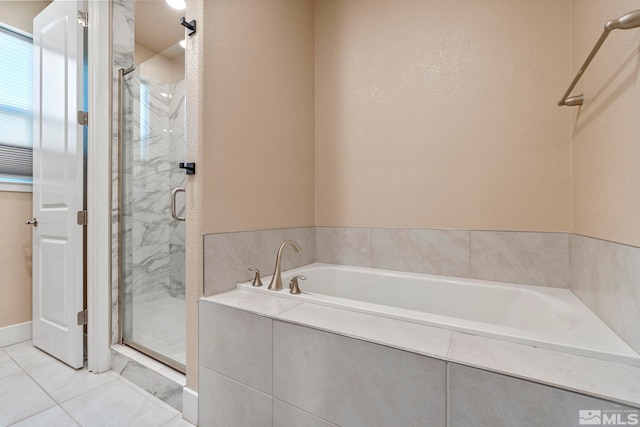 bathroom featuring tile patterned floors and plus walk in shower