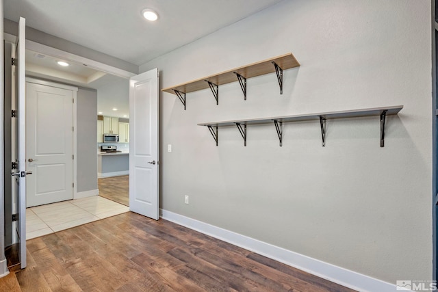 interior space with hardwood / wood-style floors