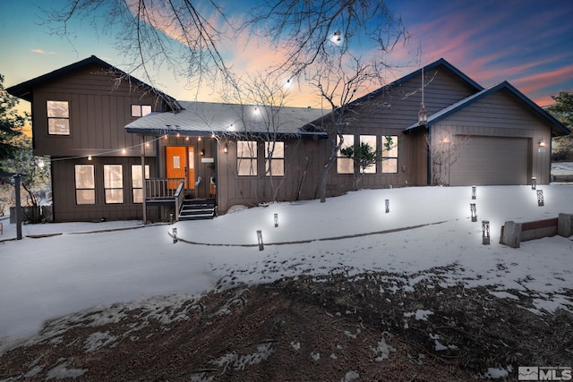 view of front of home with a garage